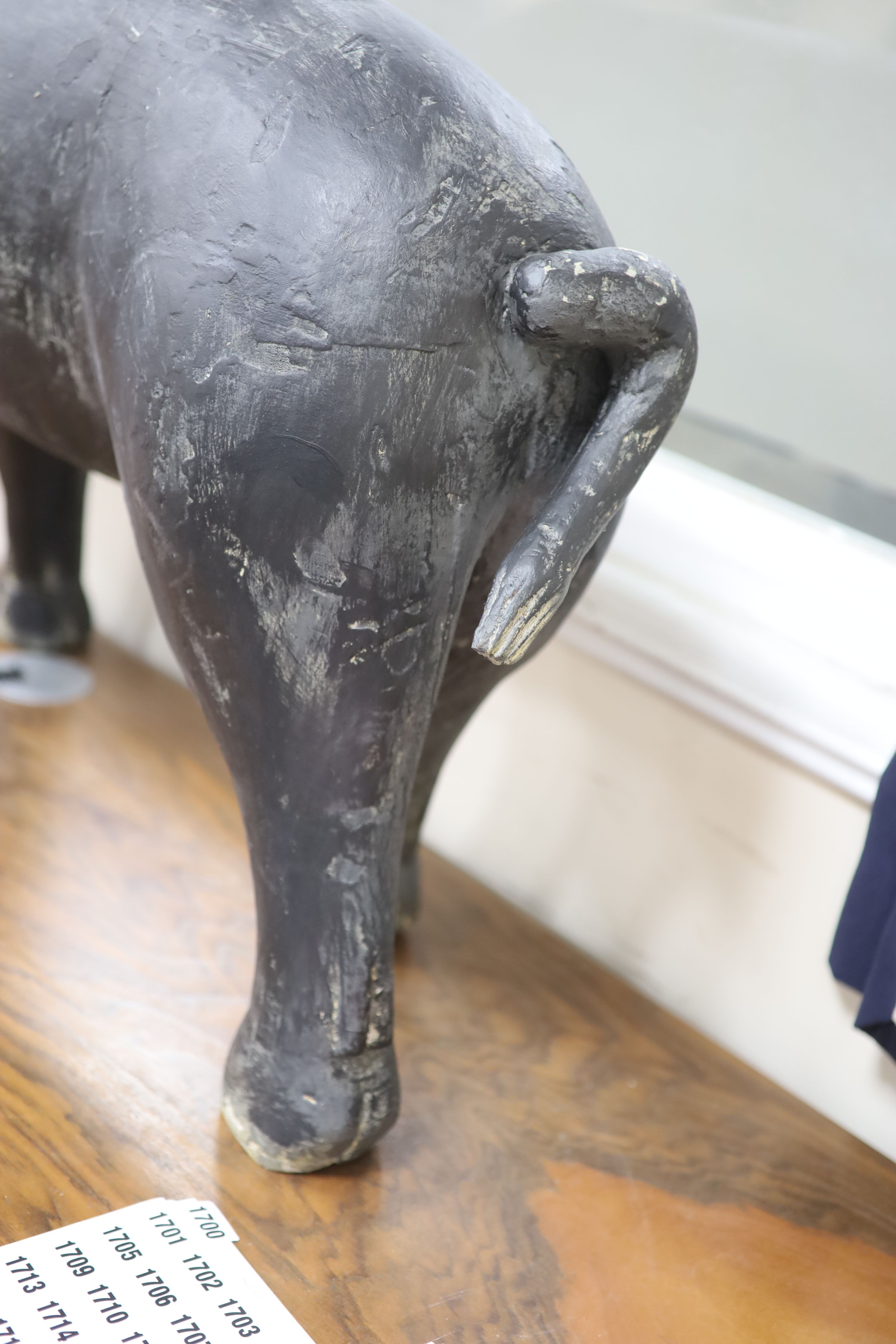 A vintage painted carved wood model of a standing pig, length 120cm